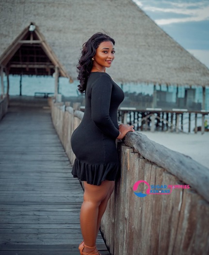 Happy 34-year-old Sugar Mummy Christine from Kileleshwa, Nairobi, seeking a genuine young partner for companionship and adventure